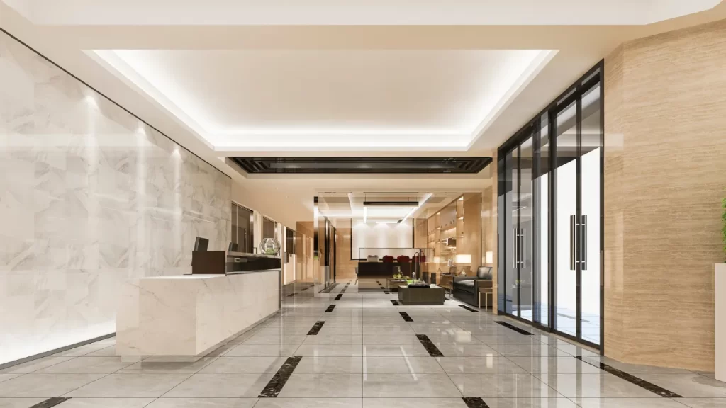 Recepção moderna com forro iluminado em gesso, representando soluções de forro para espaços comerciais elegantes e funcionais.